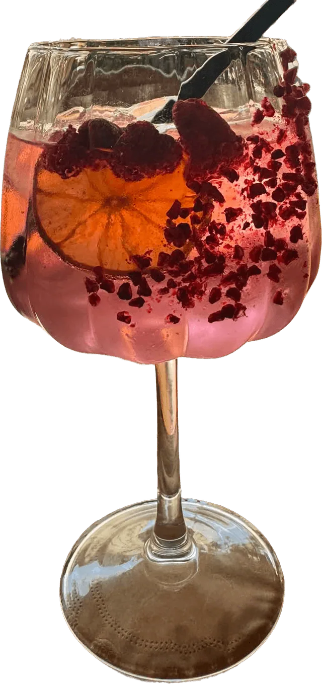 Unicorn Kiss: rózsaszín málnás gin-tonic narancskarikával